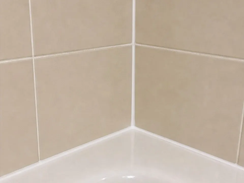Shower corner sealed after