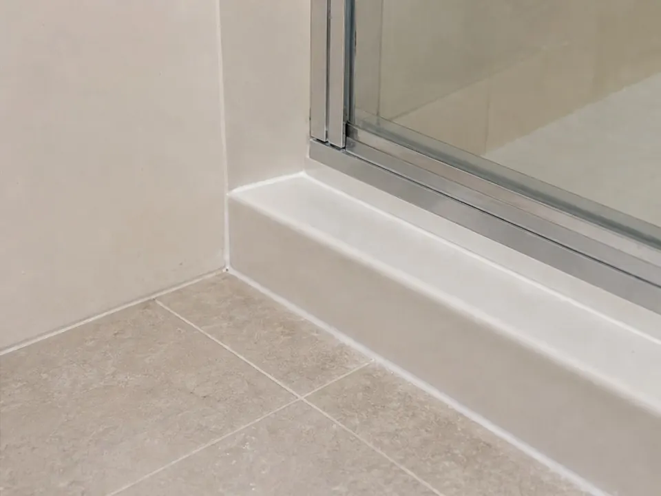 Shower curb cleaned after