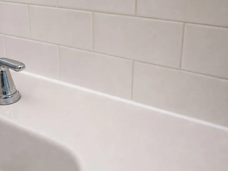 Pedestal sink backsplash after