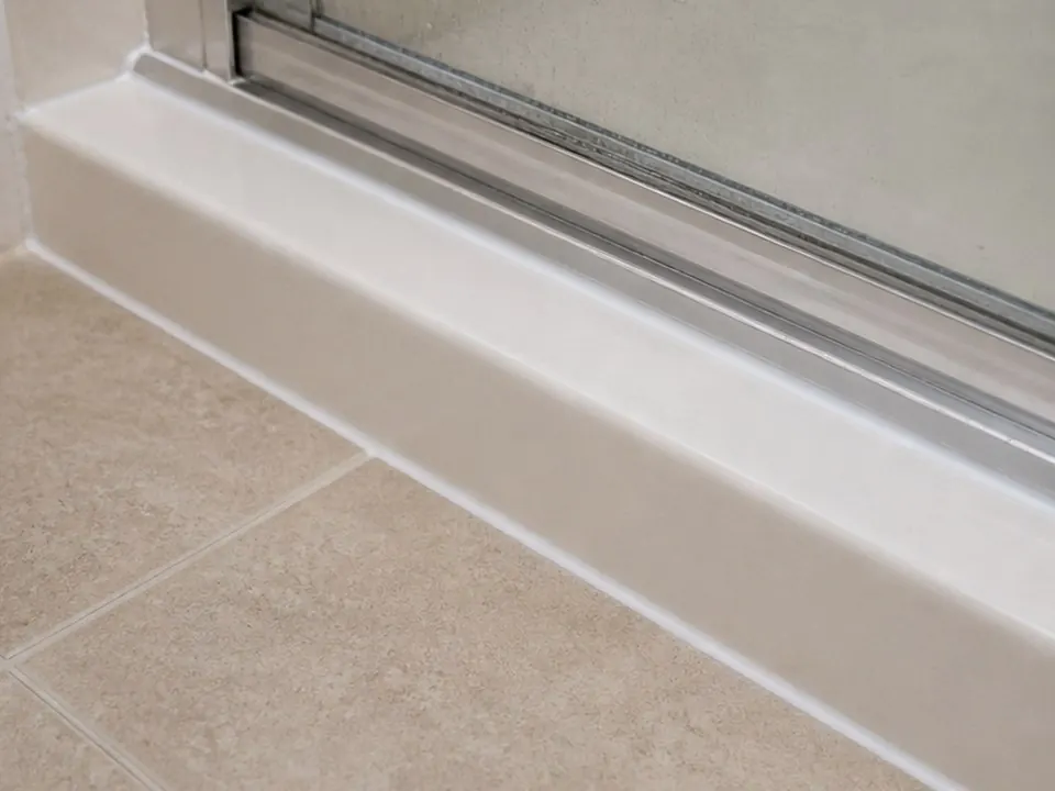 Glass door track cleaned after