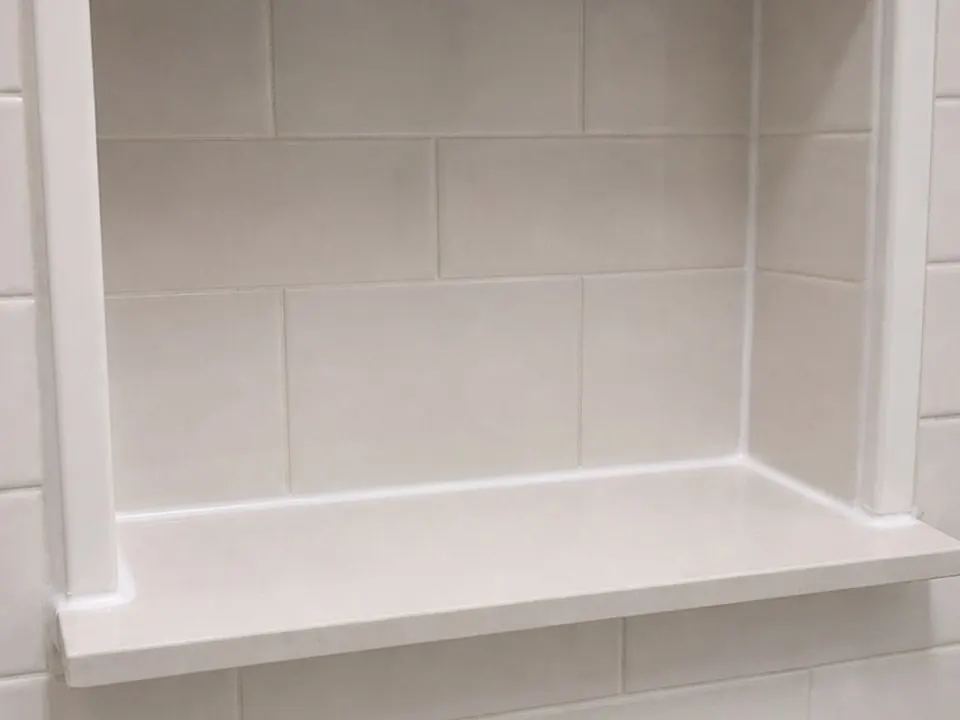 Shower niche shelf seam after