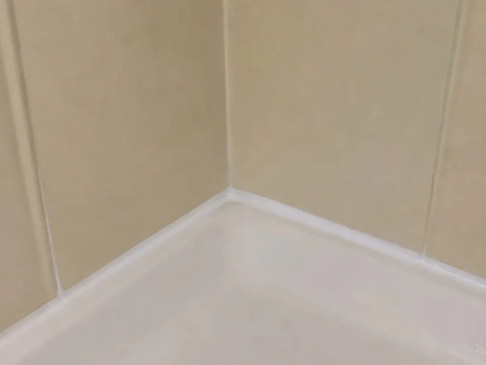 Fiberglass shower corner after