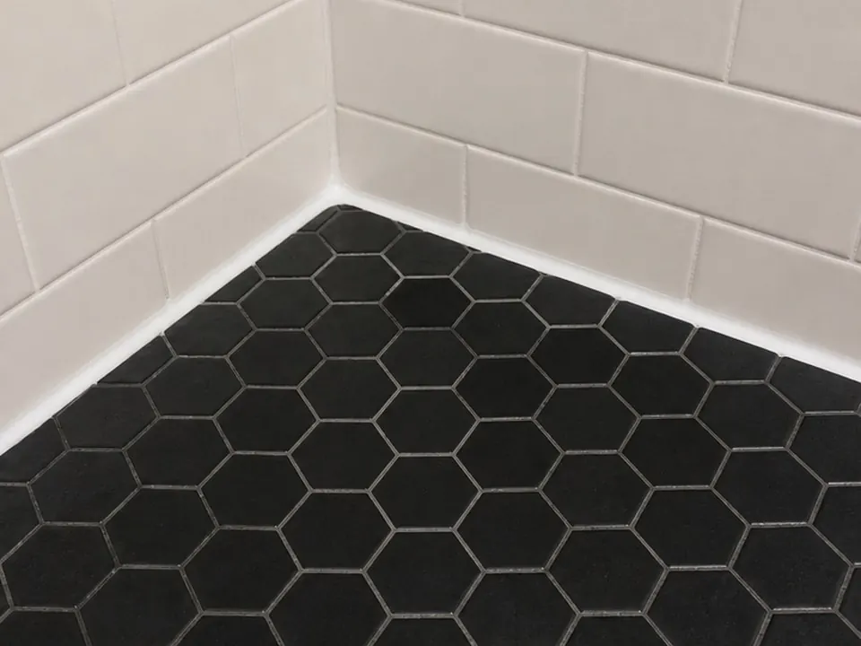 Hex tile shower edge after